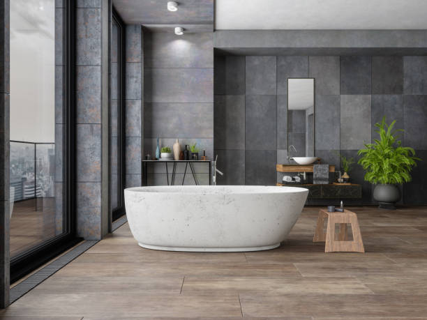 Bathroom dark tile flooring with bath tub | Tri-City Carpet